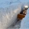 Nevicate record in Francia, serve una ruspa per liberare la strada da sette metri di neve