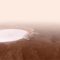 Marte, le spettacolari immagini del cratere ricoperto dal ghiaccio
